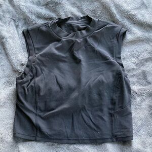 Lululemon black high neck tank top with cut out in back. Gently worn